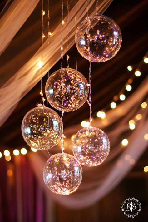 Wedding ceiling display. Crystal spheres with draped fairy lights.

Ignite your imagination and illuminate your most magical day with our compilation of 36 Enchanting Wedding Light Installation Ideas. Who knew that the right lighting could add an extra layer of whimsical charm and turn an ordinary venue into a mesmerizing wonderland? Dive into this enlightening treasure of ideas, perfect…

Read more: https://tastywed.com/generated-post-36-enchanted-wedding-light-installation-ideas/ Fairy Tale Wedding Decorations, Ceiling Display, Winter Wedding Cape, Fairytale Wedding Decorations, Installation Ideas, Wedding Ceiling, Vintage Car Wedding, Elegant Winter Wedding, Enchanting Wedding