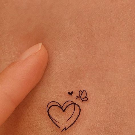 Letter And Heart Tattoo, Wrist Heart Tattoos For Women, Small Feminine Tattoos Classy, Holiday Tattoos, Classy Tattoo, Bff Tats, Side Wrist Tattoos, Tiny Heart Tattoos, Small Girly Tattoos