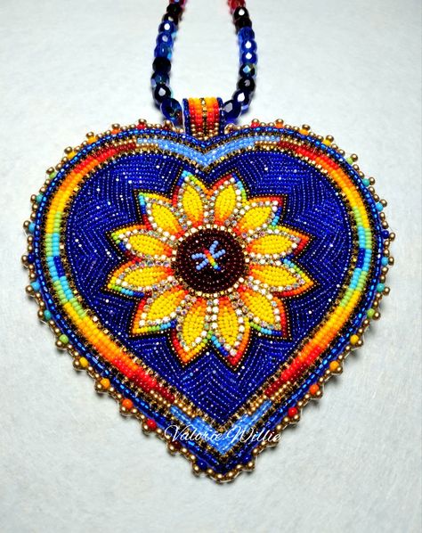 A Sunflower Medallion beaded in size 13 cuts 😍 Sunflower Beading Pattern, Fancy Shawl Regalia, Beaded Sunflower, Native Regalia, Beaded Medallion, Bead Looming, Beading Designs, Beadwork Ideas, Native American Beadwork Patterns