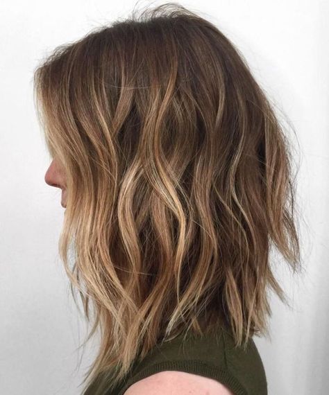 long choppy bob with light brown balayage