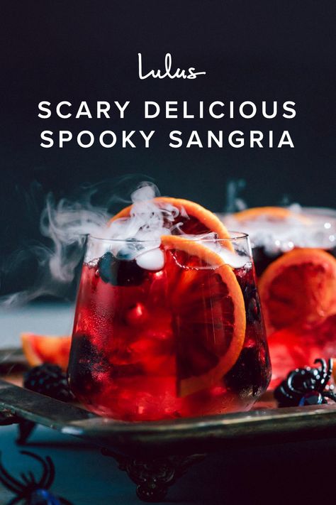 Lulus Scary Delicious Spooky Sangria is the perfect Halloween cocktail recipe for you! Made with just five ingredients (blackberries, blood oranges, pomegranate juice, red wine, and elderflower liqueur) this deliciously dark sangria will be a hit at any social gathering, or even if it’s just you and your peeps at home! We recommend adding dry ice to take the spooky factor up a notch. #lovelulus Mood With Friends, Spooky Sangria, Dry Ice Halloween, Dry Ice Cocktails, Dry Ice Drinks, Halloween Themed Drinks, Halloween Party Drinks, Halloween Drinks Alcohol, Halloween Punch