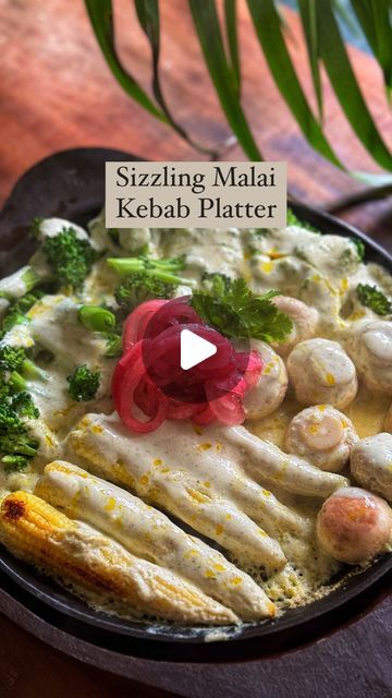 Sneha Singhi Upadhaya on Instagram: "Sizzling Malai Kebab Platter
This is the perfect weather for some kebabs or sizzlers. And, when you mix these two, you get this amazing platter. Let’s make this.

Serves 4
1/4 cup cashews, boiled
2 tbsp hung curd
1/4 cup cheese, grated
1 inch piece of ginger 
2 green chillies 
1/3-1/2 cup milk
2 tbsp cream
1 tbsp kasuri methi
1 tsp black salt 
Salt to taste 
1 tsp jeera
1 tsp chaat masala 
1/4 tsp cardamom powder 
1 tsp pepper powder 
Blitz together all the ingredients till smooth & creamy.

1 tbsp butter 
1 broccoli, parboiled (for 4 minutes)
5-6 babycorn, parboiled (for 4 minutes)
8-10 mushrooms, parboiled (for 2 minutes)
1 tbsp mustard oil 
Heat your sizzler plate & melt the butter. Add the broccoli, babycorn, mushroom & cook for 2 minutes. Add the s Kebab Platter, Sizzler Recipes, Kasuri Methi, Black Salt, Mustard Oil, Chaat Masala, Cardamom Powder, Pepper Powder, New Menu