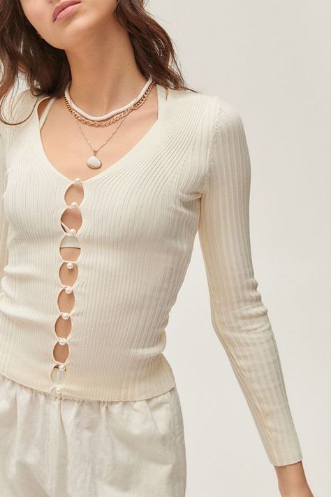 UO Bonnie Pearl Button-Up Sweater | Urban Outfitters Pearl Top, Urban Outfitters Top, Cheap Sweaters, Ribbed Turtleneck Sweater, Knit Turtleneck Sweater, Pleated Fabric, Puff Sleeve Dresses, Ribbed Knit Sweater, Pearl Buttons