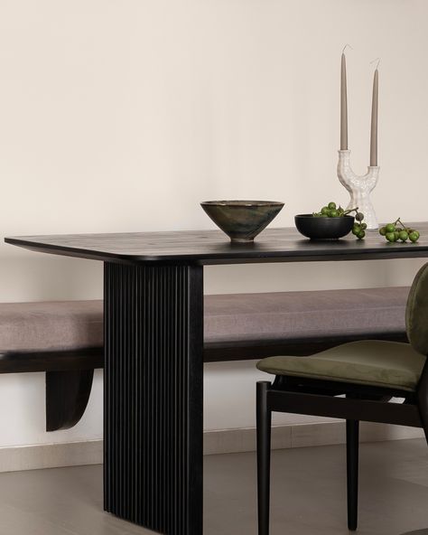 Tranquil dreams - This minimalist dining table, with rich wood texture and sculptural lines paired with a sleek, muted bench and subtle decor, is crafted to create a peaceful and intimate dining experience. The fusion of dark tones and earthy textures reflects the essence of contemporary elegance that runs through every inch of this home. Principal Designers - @saniya_jejani @loharsagar Design Team - @s1ddhant_ @pradnyxa @ar.saloni_jain Shot by - @nayansoni21 (Minimal interior design, ... Dark Dining Table, Minimalist Dining Table, Earthy Textures, Minimal Interior, Minimal Interior Design, Minimalism Interior, Wood Texture, Dining Experience, Dining Experiences