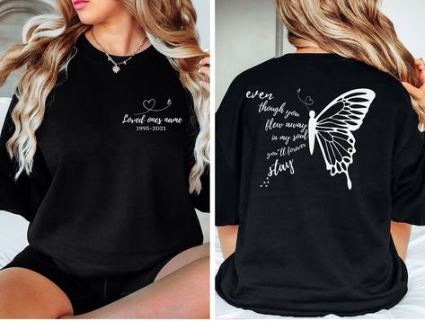 "In memory of a lost loved one tshirt, crewneck sweatshirt and hoodies. Butterfly memorial shirt with memorial quote, \"even though you flew away in my soul you'll forever stay\". Front of the shirt will come with your loved ones name and dates (dates are optional) on the left chest and the back will come with the butterfly memorial quote. Life can be hard without a beloved family member or friend, but with this In Memory of shirt you can keep them close to your heart. Personalized with your loved ones name and dates, it is the perfect way to remember someone special. For any special requests, please don't hesitate to get in touch. Adult sweatshirts - 50% cotton, 50% polyester - Medium-heavy fabric (8.0 oz/yd² (271.25 g/m - Loose fit - Sewn-in label - Runs true to size Adult T-shirt - 100% Love And Memory Shirts For Dad, Memorial Shirts In Loving Memory Papa, In Loving Memory Shirts Spanish, Memorial Tshirts In Loving, In Memory Gifts Cricut, Memorial Shirts In Loving Memory Sunflower, Long Sleeve Memorial Shirt, Memory Tshirt, Heaven Shirt