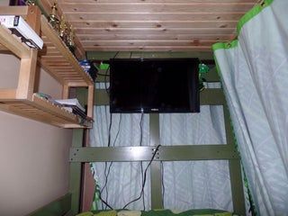 Tv Under Bunk Bed, Top Bunk Shelf Ideas, Bunk Bed Tv Ideas, Top Bunk Privacy Ideas, Dorm Top Bunk Ideas, Bunk Bed Fort Ideas, Boys Bunk Bedroom Ideas, Curtain For Bunk Bed, Lower Bunk Bed Decor Ideas