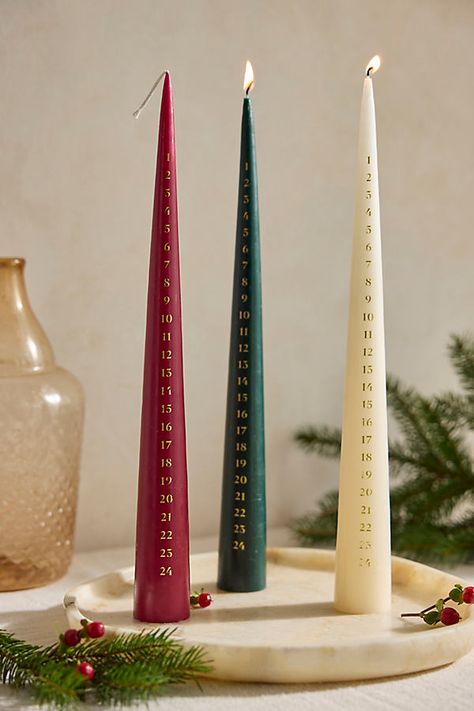 Made in Denmark, this elegantly designed Advent candle is printed with 24 dates. Light it each evening and enjoy its soft glow as you count down to Christmas. | Cone Advent Candle in Beige at Terrain Anthropologie Candle, Advent Candle, Count Down To Christmas, Holiday Picks, Christmas Candle Decorations, Globe Ornament, Advent Candles, Entertaining Essentials, Paper Gift Bags