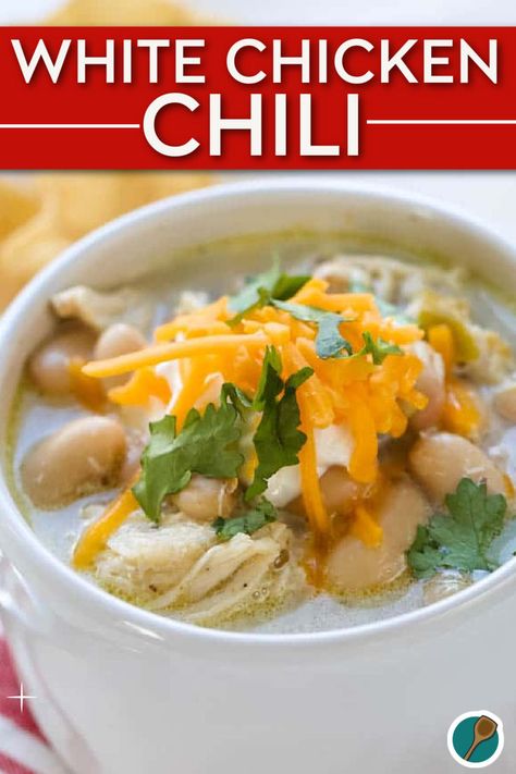 A bowl of creamy white chicken chili topped with shredded cheese, sour cream, and fresh cilantro, with tender white beans and chicken in a flavorful broth. White Chili Bean Soup, White Chili Crockpot, White Chicken Chili Crockpot, Creamy White Chicken Chili Recipe, Creamy White Chili, Chili Bean Soup, Easy White Chicken Chili, Chicken Soup Crockpot, White Chicken Chili Slow Cooker