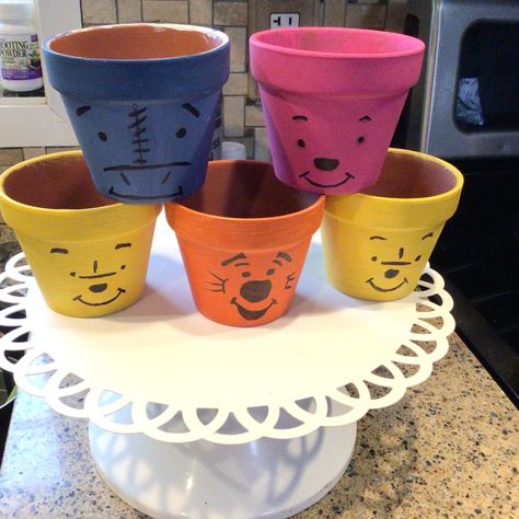 DISNEY FLOWER POTS. Pooh, Piglet, Eyeore and Tigger. Easy DIY, Acrylic Paints, Black Sharpie, and TERRA COTTA pots. Diy Winnie The Pooh, Terracotta Painting, Winnie The Pooh Piglet, Flower Pot Art, Paint Pots, Terra Cotta Pot Crafts, Pot Art, Pooh Piglet, Terra Cotta Pots