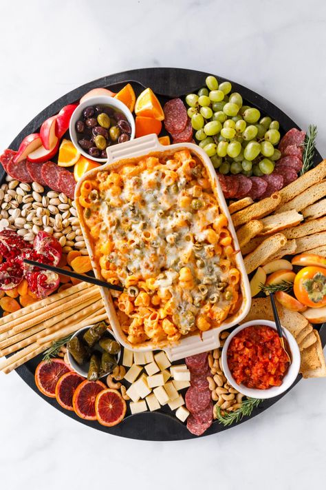 Serve a delicious charcuterie board for dinner with Delallo foods for the holidays--a Friendsgiving Pasta Bake Board made with turkey! Share Boards Food, Charcuterie Board Pasta, Spaghetti Charcuterie Board, Sharing Food Boards, Pasta Boards For Parties, Savory Food Board, Pasta Serving Ideas, Charcuterie Board Themes Dinner, Charcuterie Dinner Board Ideas