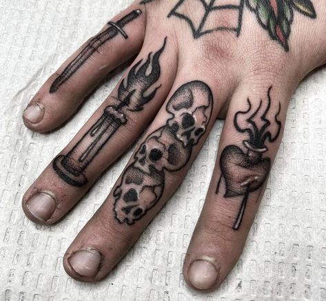 Thumb Tattoo Cover Up Ideas, American Traditional Hand Tattoos Men, Hand To Finger Tattoo, Side Finger Tattoo Men, Finger Cover Up Tattoos Men, Skull Finger Tattoos For Men, Candle Finger Tattoo, Hand Tattoos For Guys Men Small, Mens Knuckle Tattoos