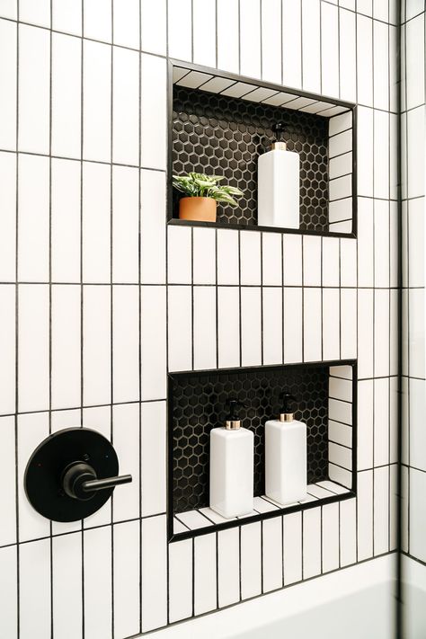 Honeycomb Bathroom Tile Showers, White Bathroom Tile Ideas Wall, Bathroom Ideas Vertical Tile, White Tile And Black Grout Bathroom, Black White Tiled Bathroom, Black Bathroom Niche, Shower Niche Black And White, Bathroom Ideas Black And White Tile, Vertical Subway Tile Shower Wall