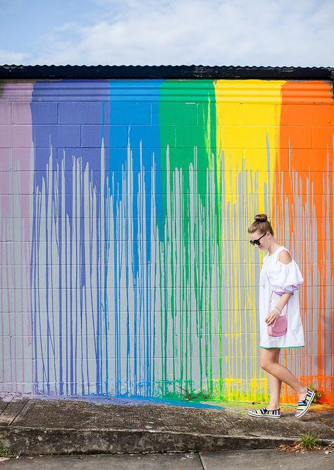 Blogger Bella Bucchiotti of xoxoBella is wearing a Chicwish cold shoulder dress that is white with colorful trim and Keds at a rainbow mural in Houston. Paint Drip Wall, Sunday School Themes, Drip Wall, Rainbow Wall Mural, Rainbow Mural, Colorful Trim, Circle House, Interior Murals, Mom Group