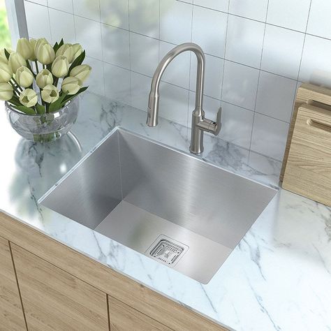 Pax Series sinks have clean geometric designs, with zero-radius corners for the distinctive look of a commercial sink in the home kitchen. This spacious undermount sink is made with T-304 stainless steel, an extra-tough and eco-friendly material. The flawless commercial-grade satin finish protects against stains and rust, and will not dull or chip from daily use. The square rear-set drain provides more usable surface area in the sink, while 95-degree sidewalls reduce splashing for easier cleanup Laundry Utility Sink, Square Kitchen Sink, Stainless Steel Utility Sink, Undermount Bar Sink, Pantry Inspiration, Countertops White, Kitchen Sink Stainless Steel, Square Kitchen, Linen Cabinets