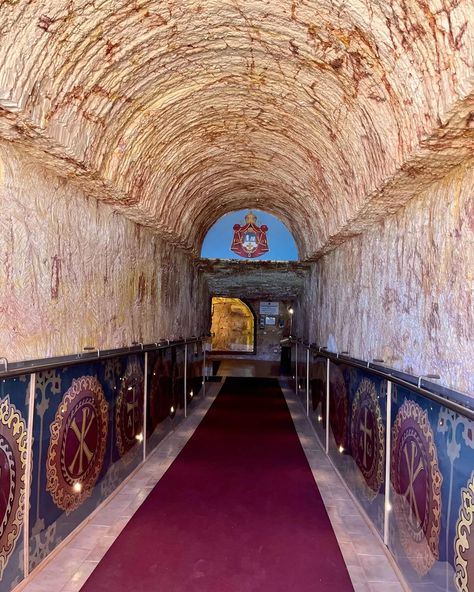 The Underground Orthodox Church of Coober Pedy Renowned for being the ‘opal capital of the world’, the small outback town of Coober Pedy can be found 846km north of Adelaide amidst the sunburnt landscapes of South Australia. The name is derived from the local Aboriginal term “kupa piti”, which translates to “white fellas’ hole”, from the Kokatha people, the traditional custodians of the land. (Naessan, 2010). An ode to the opal mining industry that prospers the town’s identity and economy ... Mining Industry, Coober Pedy, Orthodox Church, The Underground, South Australia, The Land, The Locals, Opal, Australia