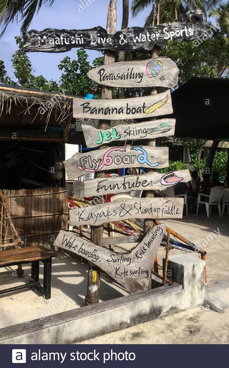 Download this stock image: Signs of water sports offer, Maafushi, Maldives, Asia - 2B4FGE1 from Alamy's library of millions of high resolution stock photos, illustrations and vectors. Maafushi Maldives, Shed Cabin, Banana Boat, Parasailing, Kite Surfing, Jet Ski, 2024 Vision, Water Sports, Maldives