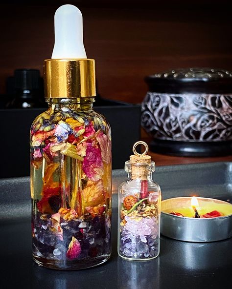 The herb infused oil contains...  -Almond Oil  -Grapefruit Essential Oil -Tangerine Essential Oil -Amethyst  -Rose Quartz  -Garnet -Orange Peel  -Rose Petals  -Lavender  -Rose Buds  -Hibiscus  -Motherwort  -Passion Flower This beauty oil was created to be used on hair, skin and nails. Please apply on small areas at first to test on skin, especially when applying the oil to the face. I highly recommend this product to be used on pulse points to get the full aromatherapy benefits {Wrists, Temples, Neck, Chest, Inner Elbow, and Behind the Ears} I also apply mine on the sides of my nose to relieve sinus pressure.  Disclaimer: Please be advised that I am not a medical professional. These products and statements have not been evaluated by the FDA. Please speak with a medical professional before Flower Infused Oil, Relieve Sinus Pressure, Tangerine Essential Oil, Infused Oil, Hair Care Recipes, Aromatherapy Benefits, Hair Skin And Nails, Grapefruit Essential Oil, Pulse Points