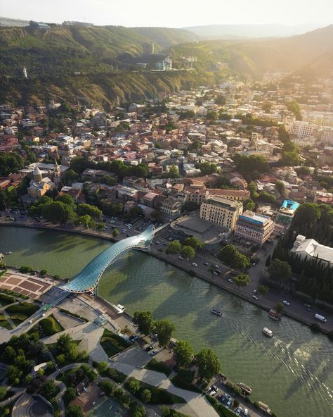 Bridge of Peace. The bridge of peace in Tbilisi is a striking architectural marvel across the Mtkvari River, located close to the Rike park and cable car station in the town. #tbilisi #georgia #exploretbilisi #travelgeorgia Cable Car Station, Car Station, Tbilisi Georgia, In The Town, Cable Car, Cable Cars, The Bridge, Georgia, Bridge