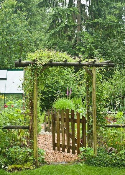 Use glow-in-the-dark pebbles to create a mystical pathway that lights up at night. Wooden Arbor With Gate, Wood Arbor Garden, Arbor Over Gate, Garden Gate Arbor, Garden Arbor With Gate, Gated Garden, Wooden Garden Gate, Garden Gates And Fencing, Garden Archway