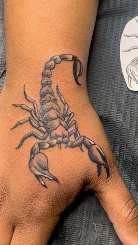 Unveil the sting: Scorpion tattoo meaning. Explore the power, resilience, and symbolism etched into this captivating ink. Scorpion Men Tattoo, Small Scorpion Tattoo For Men, Scorpion Tattoo Hand, Scorpion Tattoo Men, Scorpion Tattoo Feminine, Tattoos Powerful, Scorpion Tattoo Design, Scorpion Tattoos, Astronaut Illustration