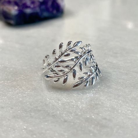 "Sterling Silver Leaf Branch Ring, Gold Leaf Ring, Silver olive Leaf Ring. Layering Ring, Vine Ring, Laurel Ring, Nature Jewelry, twig ring. This is a beautiful silver ring with olive leaves shaped in the form of a wreath. The Olive branch is a symbol of peace, harmony, and abundance, and is recognised throughout the world as a bonding symbol. The ring is beautiful as a stand-alone piece stunning to look at, and light enough to wear for every day. Your ring will arrive in one of our luxury white Gothic Accessories Jewellery, Olive Branch Ring, Olive Leaf Ring, Peace Ring, Silver Leaf Ring, Gold Leaf Rings, Laurel Leaf, Twig Ring, Raw Gemstone Ring