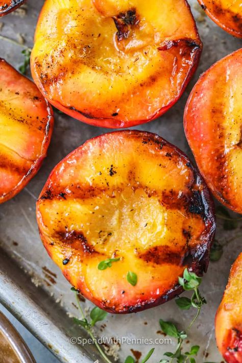 My family loves this easy grilled peaches recipes. Peaches are sliced, coated in butter, and sprinkled with brown sugar and cinnamon. They are grilled until caramelized and served with ice cream. #spendwithpennies #grilledpeaches #peachrecipes #dessert Peaches Recipes, Grilled Peaches Recipe, Gas Grill Recipes, Cream Desserts Recipes, Peach Dumplings, Grilled Peach Salad, Spinach Strawberry Salad, Grilled Fruit, Spend With Pennies