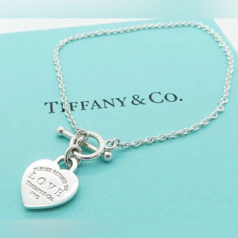 Tiffany & Co. Authentic | Return To Tiffany Toggle Bracelet .925 Blue Enamel Please Return To Tiffany Collection Authentic Brand New Tiffany & Co. Bracelet Rare, Discontinued Bracelet Classic Tiffany & Co. Style Original Packaging Included: Classic Tiffany Blue Box W. White Satin Ribbon Tiffany & Co. Blue Felt Pouch Small Shopping Bag Gift Card/Envelope White Tissue Paper (Not Pictured) Free Shipping ~ Offers Encouraged Please Reach Out If Interested For More Photos Thrift Manifest, Tiffany Gifts, Tiffany Blue Box, White Tissue Paper, Preppy Life, Tiffany And Co Jewelry, Gift Card Envelope, Felt Pouch, Return To Tiffany