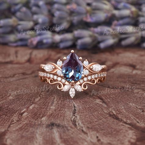 Unique Pear Cut Alexandrite Engagement Ring Set Rose Gold - Etsy Fairytale Engagement Rings, Moissanite Wedding Ring Set, Cute Engagement Rings, Future Engagement Rings, Moissanite Wedding Ring, Alexandrite Engagement Ring, Floral Ring, Dream Engagement Rings, Moissanite Wedding Rings