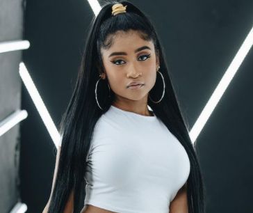 Grind Award-winning, Young Lyric well-known as uprising rapper in the industry. She became popular for her singles that went viral 'Drop A Bag featuring Cuban Doll'. Shakur Stevenson, Young Lyric, Cuban Doll, American Boxer, Pregnant Baby, Baby Bump Photos, Bump Photos, With Boyfriend, American Rappers