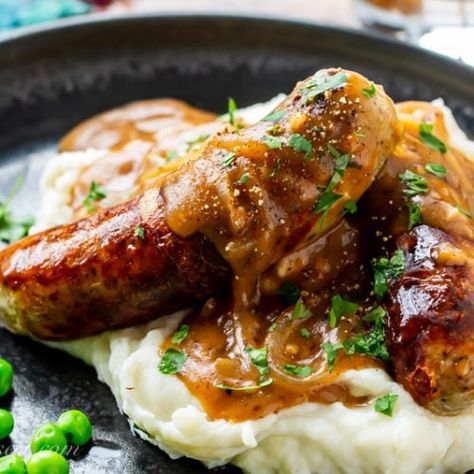 Bangers and Mash with onion gravy - Saving Room for Dessert Buffalo Chicken Burgers, Grilled Buffalo Chicken, Sausage And Mash, Buttery Mashed Potatoes, Cacciatore Recipes, Beef Tips And Gravy, Chicken Cacciatore Recipe, Chicken Burgers Recipe, Creamy Mash