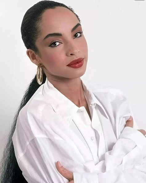 #SwagHerAppreciationPost Today's appreciation post is for #IconicSinger #Sade (Name a few of your favorite songs) Sade Adu was born on January 16, 1959 the enchanting singer, is a timeless icon in the music industry. Known for her soulful voice and hits like "Smooth Operator," #Sade has captivated audiences globally for decades. With an illustrious career, she remains a symbol of elegance in smooth jazz and R&B. Her contributions have earned her a special place in the hearts of fans worldwi... Sade Adu Photoshoot, Sade Adu, Sisters Photoshoot Poses, Sisters Photoshoot, Diamond Life, The Music Industry, Smooth Operator, Smooth Jazz, Strong Love