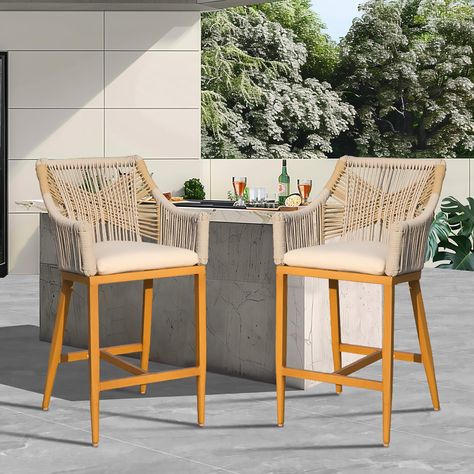 PRICES MAY VARY. 🍹✨Modern Aesthetics-- Domi outdoor bar chairs are polished a teak-colored varnished finish on the aluminum frame, this aesthetic appeal elevates your outdoor life time and is suitable for various outdoor settings, making them an excellent addition to your patio, balcony, or poolside. 🍹✨All-Weather Use Rope-- Textilene rope features in waterproof, UV-resistant, and fade-resistant, which make the backrest of domi outdoor bar stools being durable and strong. Plus, interweaving ro Outdoor Bar Stools With Backs, Outdoor Bar Chairs, Modern Outdoor Bar, Outdoor Counter, Tall Bar Stools, Aluminum Chairs, Counter Height Chairs, Patio Balcony, Counter Height Bar