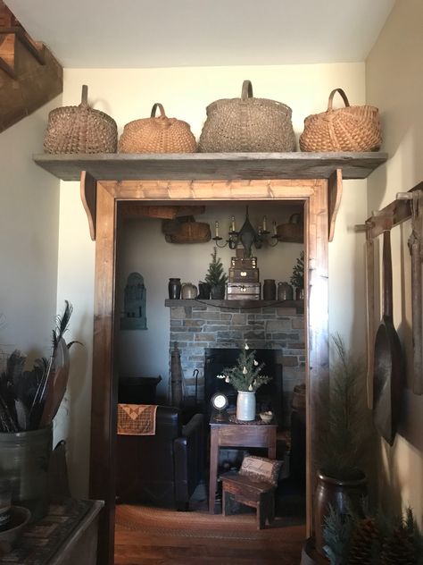 Above the door shelf we made for the large antique gathering baskets. Above Door Decor, Primitive Shelves, Primitive Bedroom, Primitive Country Homes, Primitive Living Room, Primitive Living, Door Shelf, Primitive House, Primative Decor