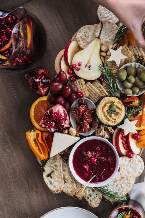 The holidays are the perfect time for entertaining family and friends and of course great food. This festive boozy cranberry sauce is the perfect addition to any holiday table or charcuterie board. This sauce is simple and delicious. Vegan charcuterie board, cranberry sauce homemade, cranberry sauce orange, cranberry sauce recipe, vegan charcuterie board, vegan charcuterie board ideas. #cranberrysauce #veganrecipes #christmasrecipes Charcuterie Board Vegan, Vegan Charcuterie Board Ideas, Cranberry Sauce Orange, Fancy Party Food, Vegan Charcuterie Board, Orange Cranberry Sauce, Pescetarian Recipes, Homemade Cranberry Sauce, Charcuterie Board Ideas