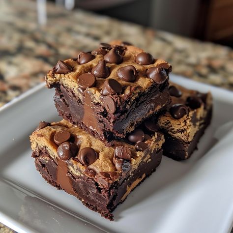 🍪💣 Explode with sweetness! Chocolate Chip Cookie Dough Brownie Bombs: a triple threat treat. #SweetTooth #BrownieBombs Chocolate Chip Cookie Dough Brownie Bombs Recipe Unleash irresistible layers of brownies, cookie dough, and chocolate in one decadent bite! Ingredients: Brownies, prepared and cooled: 400g (cut into 1-inch squares) Chocolate chip cookie dough (eggless): 300g Dark chocolate, chopped: 200g White chocolate, for drizzle: 50g Mini chocolate chips, for garnish: 50g Directions: ... Brownies Cookie Dough, Chocolate Chip Cookie Dough Brownies, Food Reference, Cookie Dough Brownies, Instagram Recipes, Brownie Batter, Trending Recipes, Brownie Bar, Chocolate Chip Cookie Dough