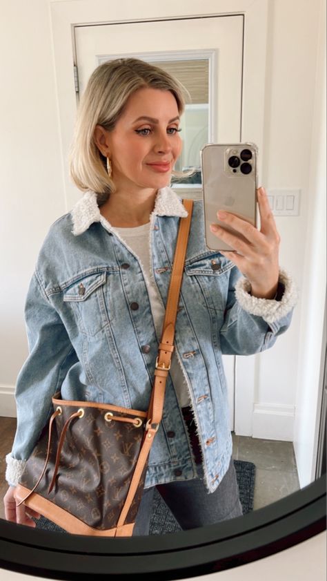 Erica Cook in a light denim Sherpa lined jean jacket with Louis Vuitton nano bucket Fleece Lined Denim Jacket Outfit, Lined Denim Jacket Outfit, Fleece Lined Denim Jacket, Lined Jean Jacket, Light Denim Jacket, Denim Jacket Outfit, Lined Denim Jacket, Denim Trucker Jacket, Line Light