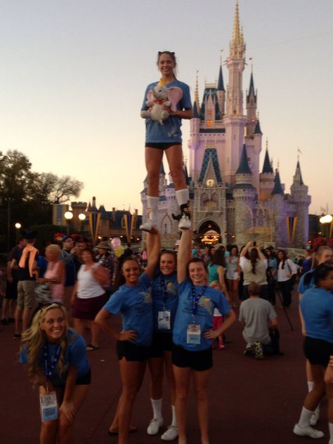 My favorite competition when I cheering throughout my life was the National High School Cheerleading Championship in Orlando, FL at Disney World. Here is me with my stunt group at the time posing in front of the beautiful Cinderella Castle. Cheer Nationals, Cool Cheer Stunts, Famous Cheerleaders, Cheer Flyer, Cheer Dance Routines, Cheer Team Pictures, Sideline Cheer, Cheer Photography, High School Cheerleading