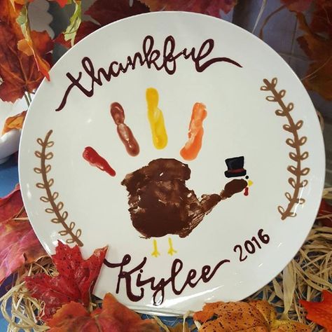 Kids Handprint Turkey Plates $21 Thanksgiving Dinner Plates, Handprint Turkey, Turkey Handprint Craft, Thanksgiving Platter, Baby Christmas Crafts, Baby Footprint Art, Turkey Plates, Turkey Handprint, Thanksgiving Crafts Preschool