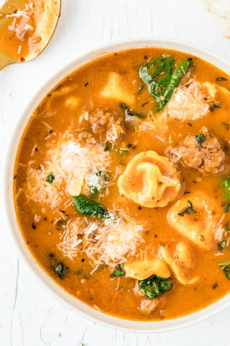 This SAUSAGE TORTELLINI SOUP  is a hearty, flavorful soup that comes together in less than an hour. Italian sausage, tortellini and spinach in a thick creamy tomato broth. Italian Sausage Tortellini, Creamy Tortellini Soup, Spinach Tortellini Soup, Sausage Tortellini Soup, Jimmy Dean Sausage, Homemade Soups, Sausage Tortellini, Tomato Broth, Chili Soup