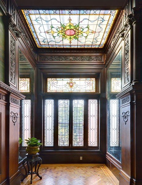 The interiors feature exquisite original details, including coffered ceilings, inlaid parquet flooring, wood paneling, hand-painted frescoes and murals, and stained-glass accent windows. Victorian Life, Brooklyn Brownstone, Victorian Interior, زج�اج ملون, Victorian Interiors, This Old House, Best Interior Design, Architectural Digest, Historic Homes