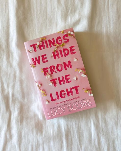 book : things we hide from the light by @scorelucy review : honestly I did not love this book. I still enjoyed it but I did not love it like the first one. I think Nash was a bit too much at times and that his relationship with Lina felt forced at times. I think I will like the next book better! who should read this : people who enjoy insta love where I bought it : @target spice : 🌶️ skip chapters 5, 13, 35, 36, 38, 44 #thingswehidefromthelight #lucyscore #romancereader #bookstagram Lucy Score, Small Town Romance, Pink Books, Book Layout, Book Bundles, Her. Book, Book Photography, Book Set, Book Aesthetic