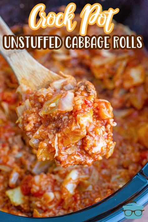 a wooden spoon holding up a serving of unstuffed cabbage rolls over an oval slow cooker. Crockpot Cabbage Recipes, Unstuffed Cabbage Rolls, Cabbage Roll Casserole, Crock Pot Cabbage, Stuffed Cabbage Rolls, Unstuffed Cabbage, Cabbage Roll Soup, Cabbage Roll, Cabbage Rolls Recipe