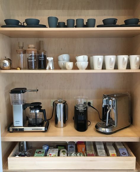 organized pantry cabinet with coffee station and tea drawer by laura cattano. Organizational Design, Mug Storage, Kate Marker Interiors, Huge Kitchen, Glass Front Cabinets, Home Coffee Bar, Small Cabinet, White Countertops, Kitchen Cabinet Colors