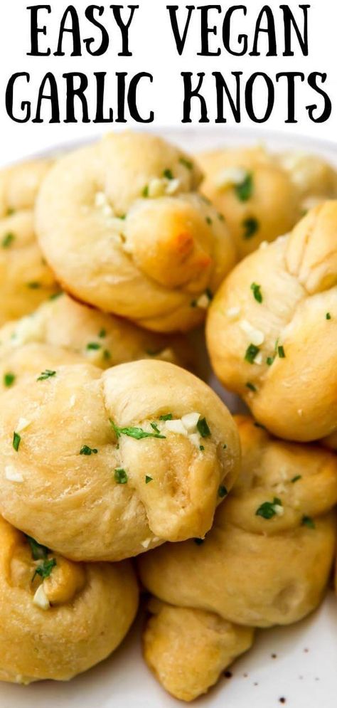 These easy vegan garlic knots are the perfect addition to any meal! Made quick and easy from pizza dough and vegan garlic butter, these warm buttery creations bake up in minutes and are packed with flavor. Vegan Garlic Bread Recipe, Vegan Dough Recipe, Vegan Garlic Knots Recipe, Vegan Garlic Knots, Vegan Garlic Butter, Vegan Garlic Bread, Garlic Butter For Bread, Garlic Flatbread, Challah Bread Recipes