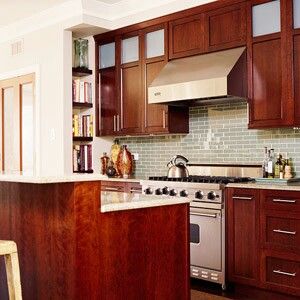 Love the green glass backsplash with cherry cabinetry Kitchen Aesthetic Vintage, Vintage Kitchen Aesthetic, Vintage Kitchen Decor Ideas, Kitchens Decor, Cherry Wood Kitchens, Cherry Wood Cabinets, Green Backsplash, White Granite Countertops, Vintage Kitchens