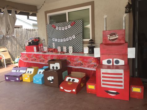 Diy Cars Movie Decorations, Lighting Mcqueen Cardboard Box Car, Lightning Mcqueen Diy Box Car, Disney Cars Birthday Backdrop, Disney Cars Theme Birthday Party, Disney Cars Cardboard Box Car, Cars Birthday Party Decorations, Disney Cars Party, Disney Cars Birthday