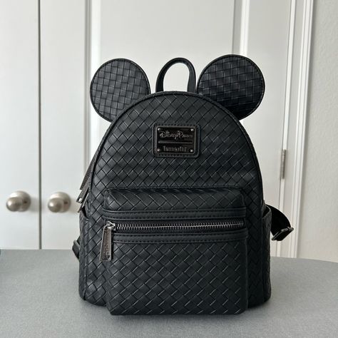 Brand New Never Used Pet Free Smoke Free Home This Dramatic Black Mini Backpack Is Perfect For Stowing All Your On-The-Go Essentials. Featuring An Allover Woven Design In Simulated Leather, This Loungefly Bag Is Accented With 3d Mickey Mouse Ears, A Front Zip Pocket, And Large Main Compartment. Magic In The Details Created Especially For Walt Disney World Resort And Disneyland Resort Simulated Leather Backpack With 3d Mickey Ears Allover Woven Design Front Zip Pocket Double Zipper Main Compartme Tinker Bell Cosplay, 3d Mickey Mouse, Alice In Wonderland Paintings, Painting The Roses Red, Loungefly Bag, Mickey Mouse Ears, Loungefly Disney, Bare Necessities, Disney Lilo