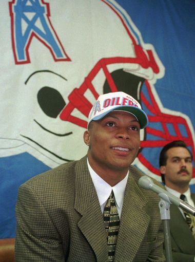 Houston Oilers first-round pick Eddie George answers Eddie George, Houston Oilers, Standing Ovation, The Titans, Running Back, Tennessee Titans, Sports Illustrated, Tennessee, Nissan