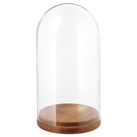 HÄRLIGA Glass dome with base, clear glass, Height: 10 ¾" Diameter: 5 1/2". The glass dome with base can be used to display your favorite decorative items. Hemnes Shoe Cabinet, Curtain Wire, Ikea Shopping, Ikea Website, Recycling Facility, Artificial Fruit, Glass Dome, Shoe Cabinet, Wooden Base