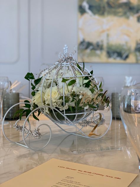 Bridal shower centerpiece. Cinderella carriage Cinderella Bridal Shower Ideas, Carriage With Flowers, Cinderella Carriage Centerpiece, Cinderella Centerpiece, Cinderella Bridal Shower, Bridal Shower Centerpiece, Quince Decor, Cinderella Carriage, Dance Themes